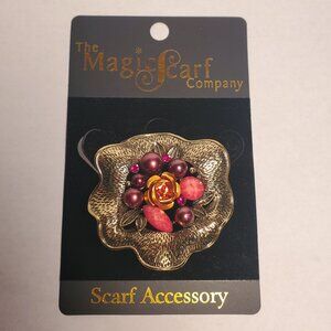 Magic Scarf Company gold scarf accessory with beaded design.